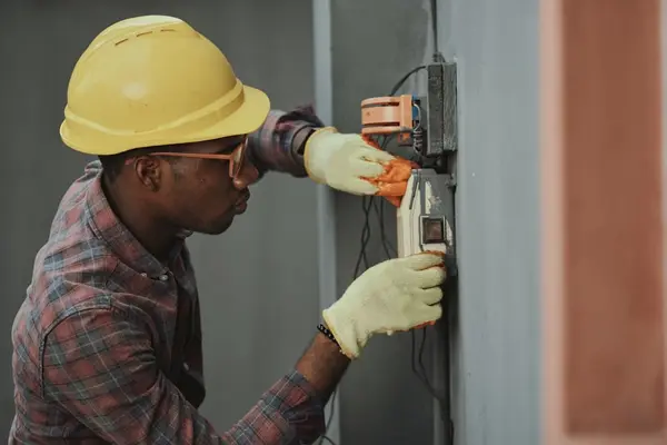 Trainee working with tools on the job